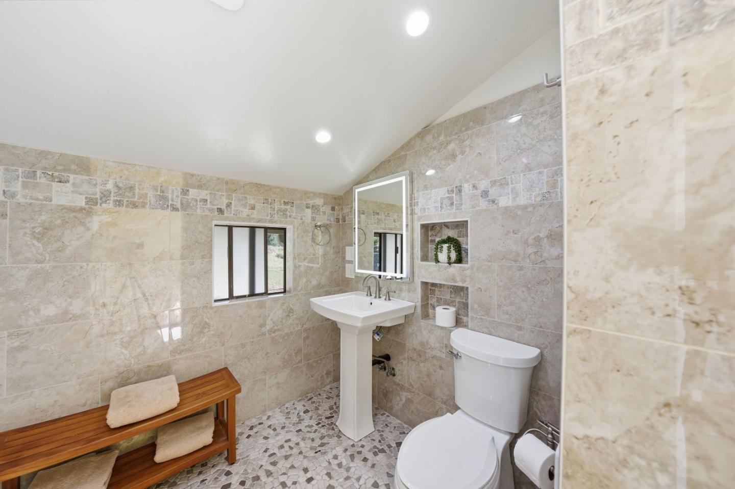 701 Day Valley Road Aptos, CA 95003 - Photo 34 of 43 a bathroom with a toilet sink and mirror