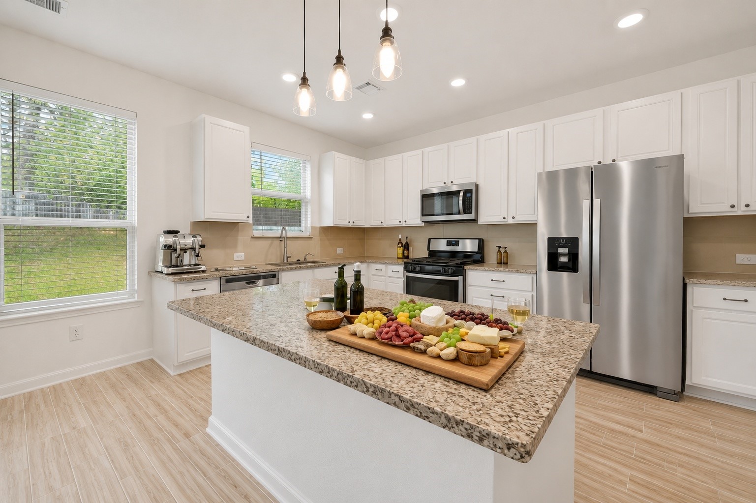 2107 Parnevik Place Conroe, TX 77304 - Photo 13 of 44 The generous kitchen island and 2 walls of cabinets provide counter space for meal prep and storage. digitally enhanced
