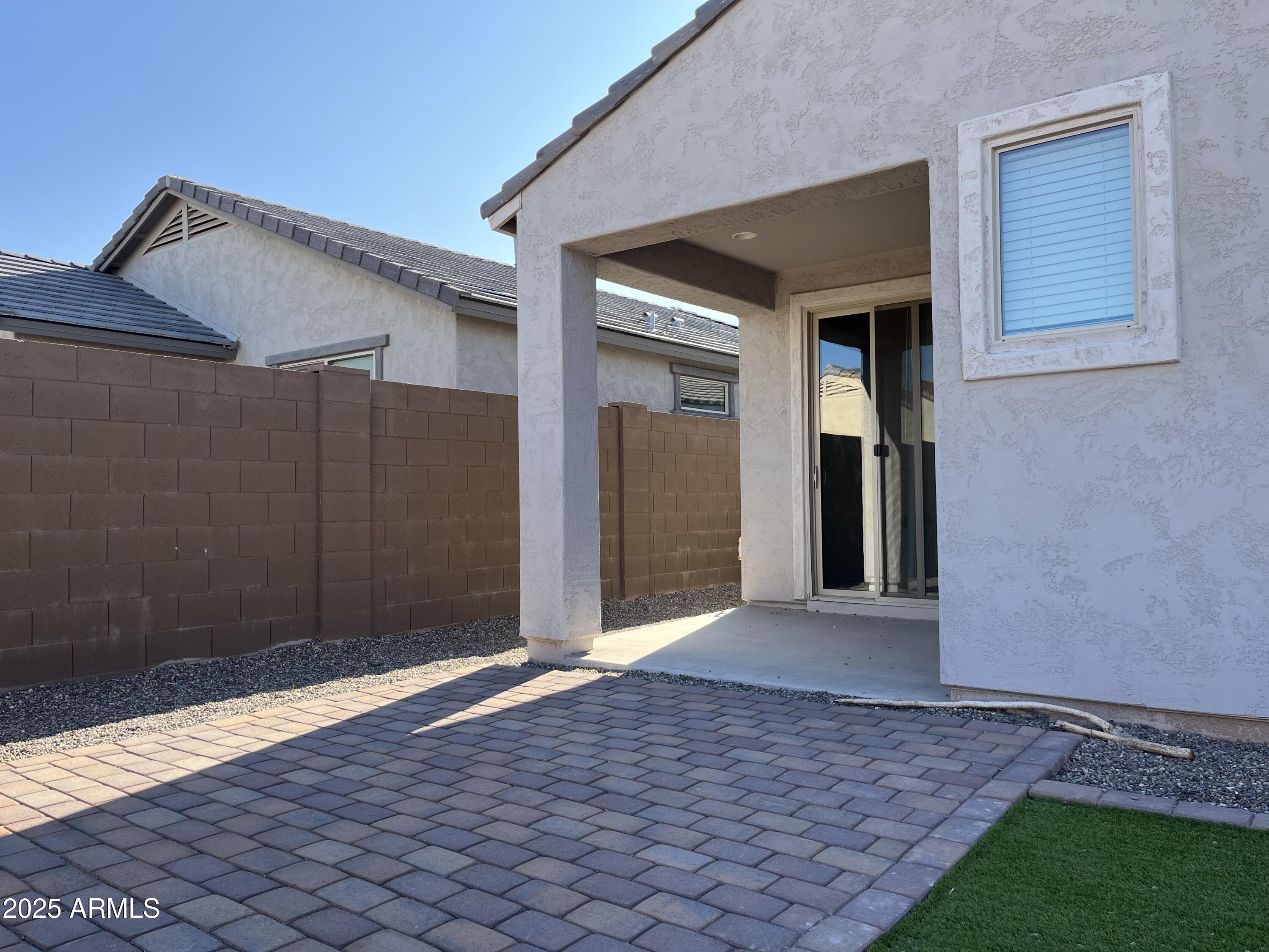 6970 West Gwen Street Laveen, AZ 85339 - Photo 29 of 30 a view of backyard with entryway