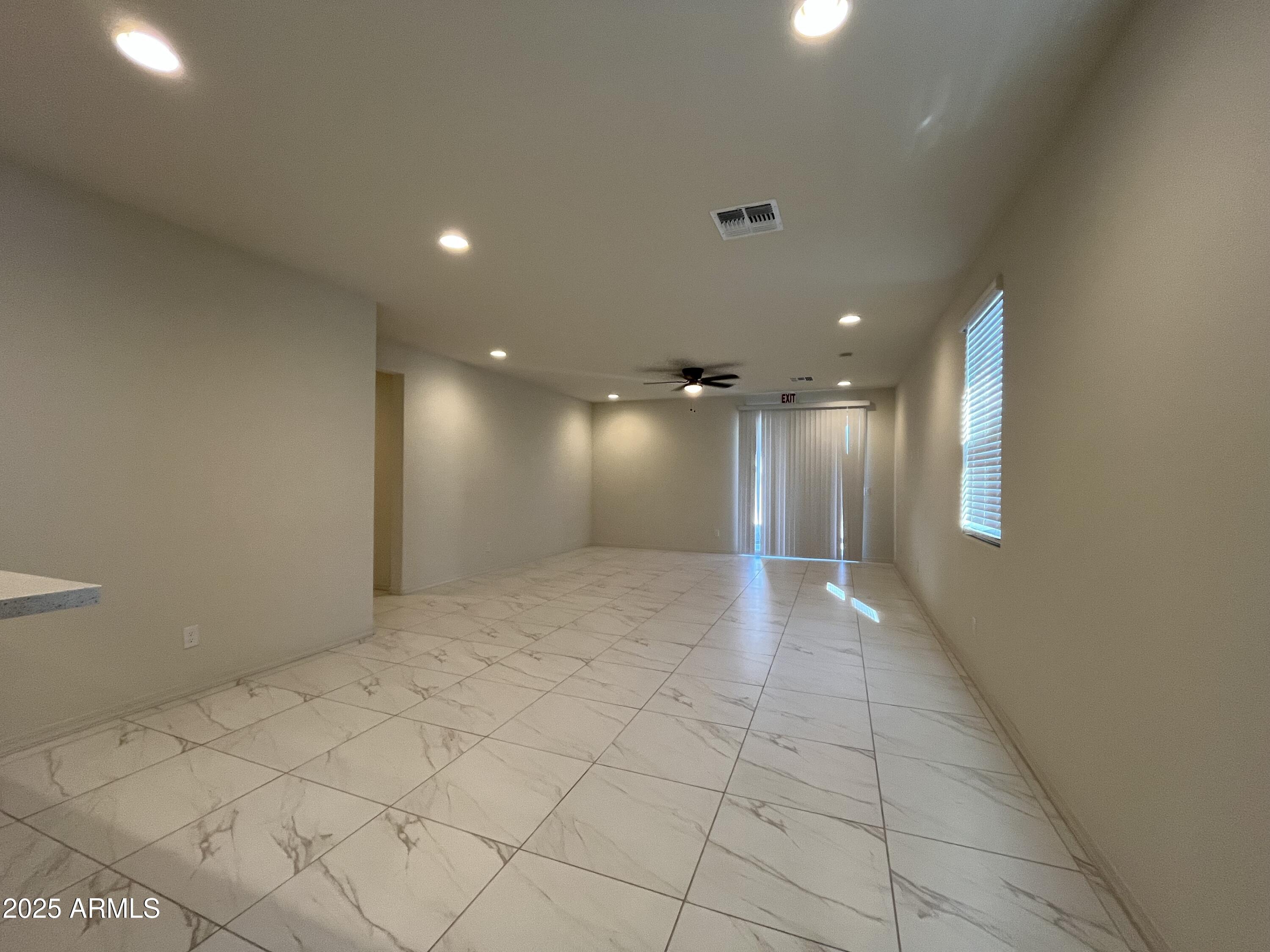 6970 West Gwen Street Laveen, AZ 85339 - Photo 4 of 30 a view of an empty room