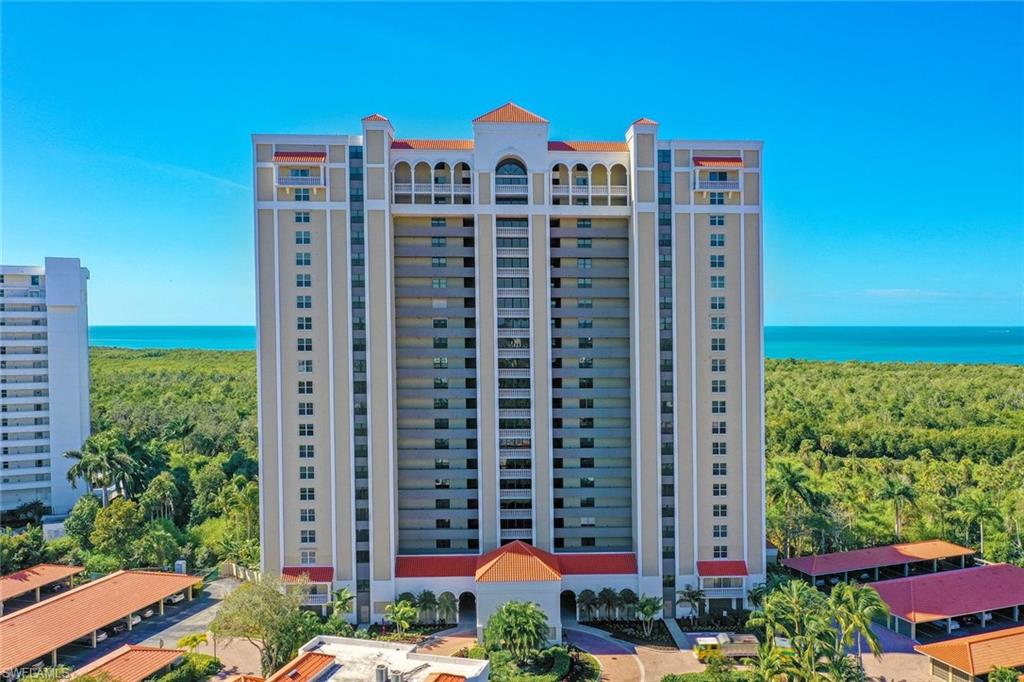 6573 Marissa Loop, Unit 2003 Naples, FL 34108 - Photo 2 of 41 a view of a city with tall buildings