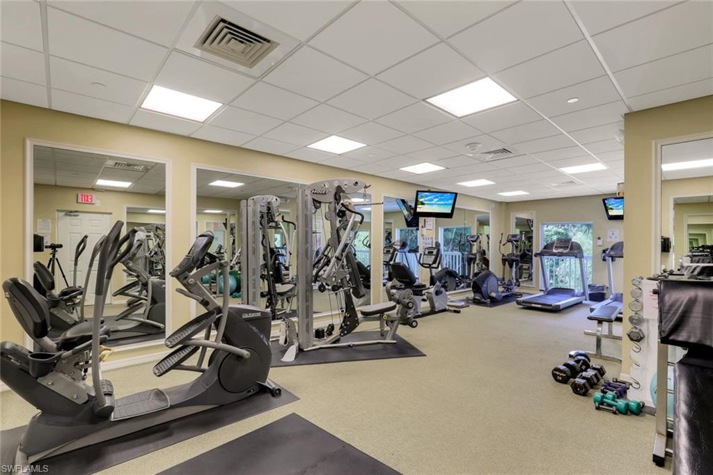 6573 Marissa Loop, Unit 2003 Naples, FL 34108 - Photo 29 of 41 a view of a room with gym equipment