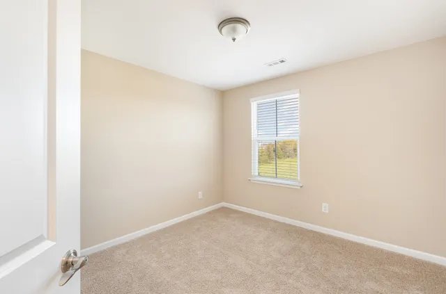 a view of a livingroom with a window