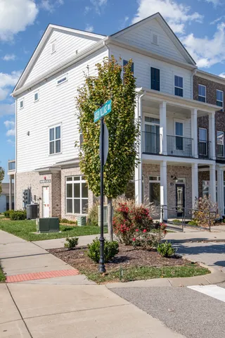a front view of a building with street view