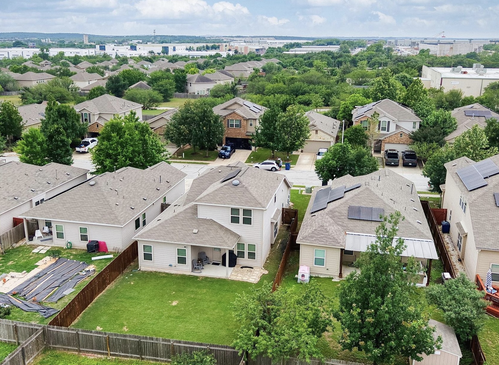 6905 Vail Ridge Street Austin, TX 78744 - Photo 33 of 39 Aerial perspective of the fully-fenced backyard.