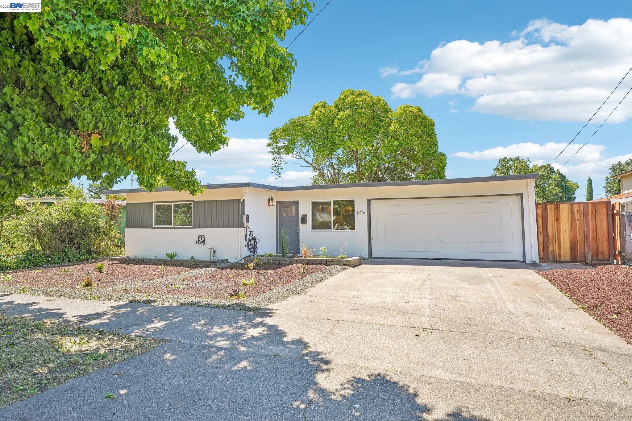 606 West 9th Street Santa Rosa, CA 95401 - Photo 4 of 52 a view of a house with a backyard