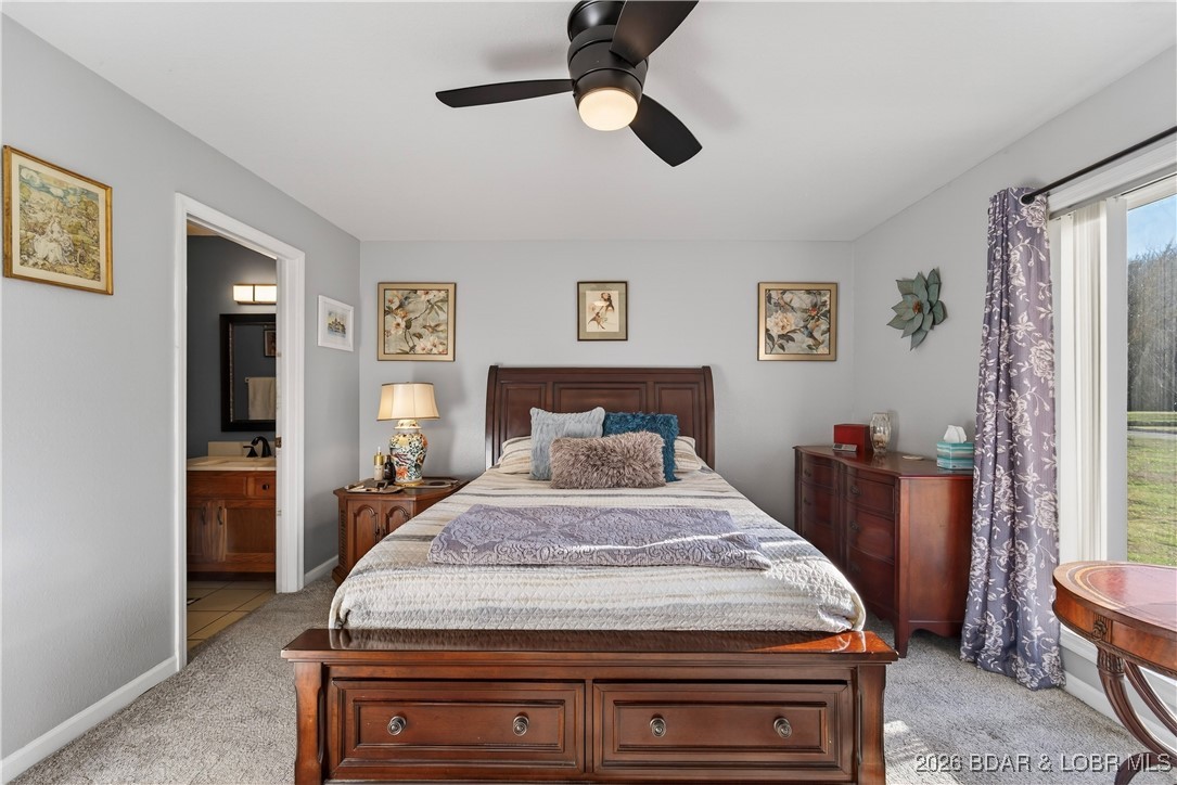 100 Osage Hills Road, Unit 201 Lake Ozark, MO 65049 - Photo 20 of 42 Master bedroom