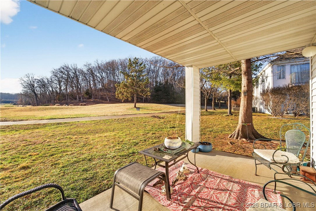 100 Osage Hills Road, Unit 201 Lake Ozark, MO 65049 - Photo 25 of 42 Back Patio