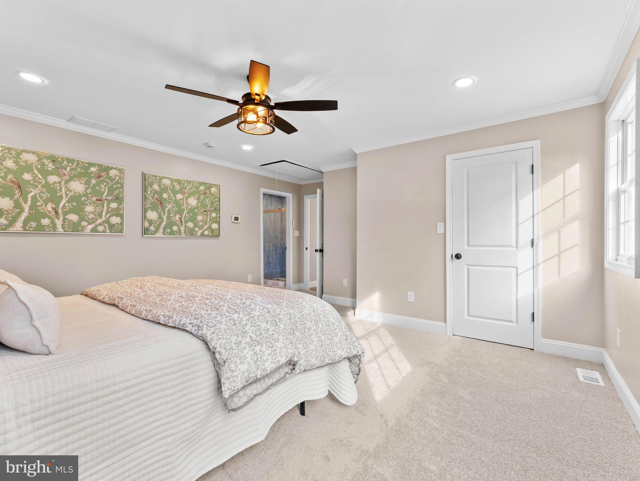 800 Bentley Road Lindenwold, NJ 08021 - Photo 14 of 32 a bedroom with a large bed a chandelier and window