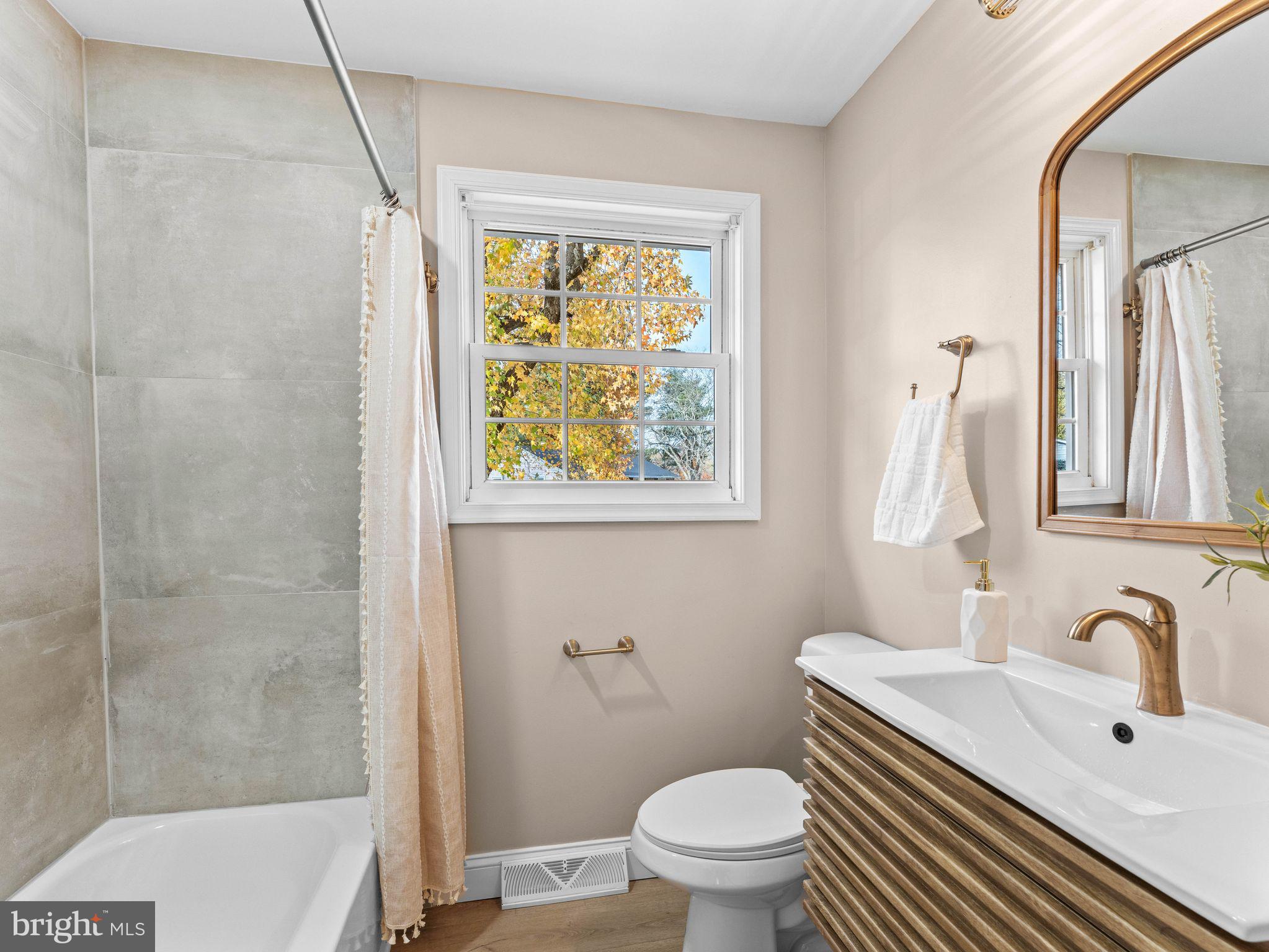 800 Bentley Road Lindenwold, NJ 08021 - Photo 23 of 32 a bathroom with a sink a toilet and shower