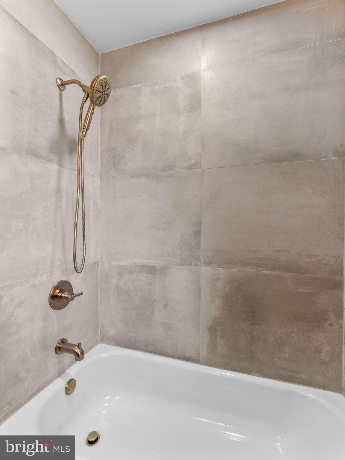 800 Bentley Road Lindenwold, NJ 08021 - Photo 25 of 32 a bathroom with a shower and a bathtub