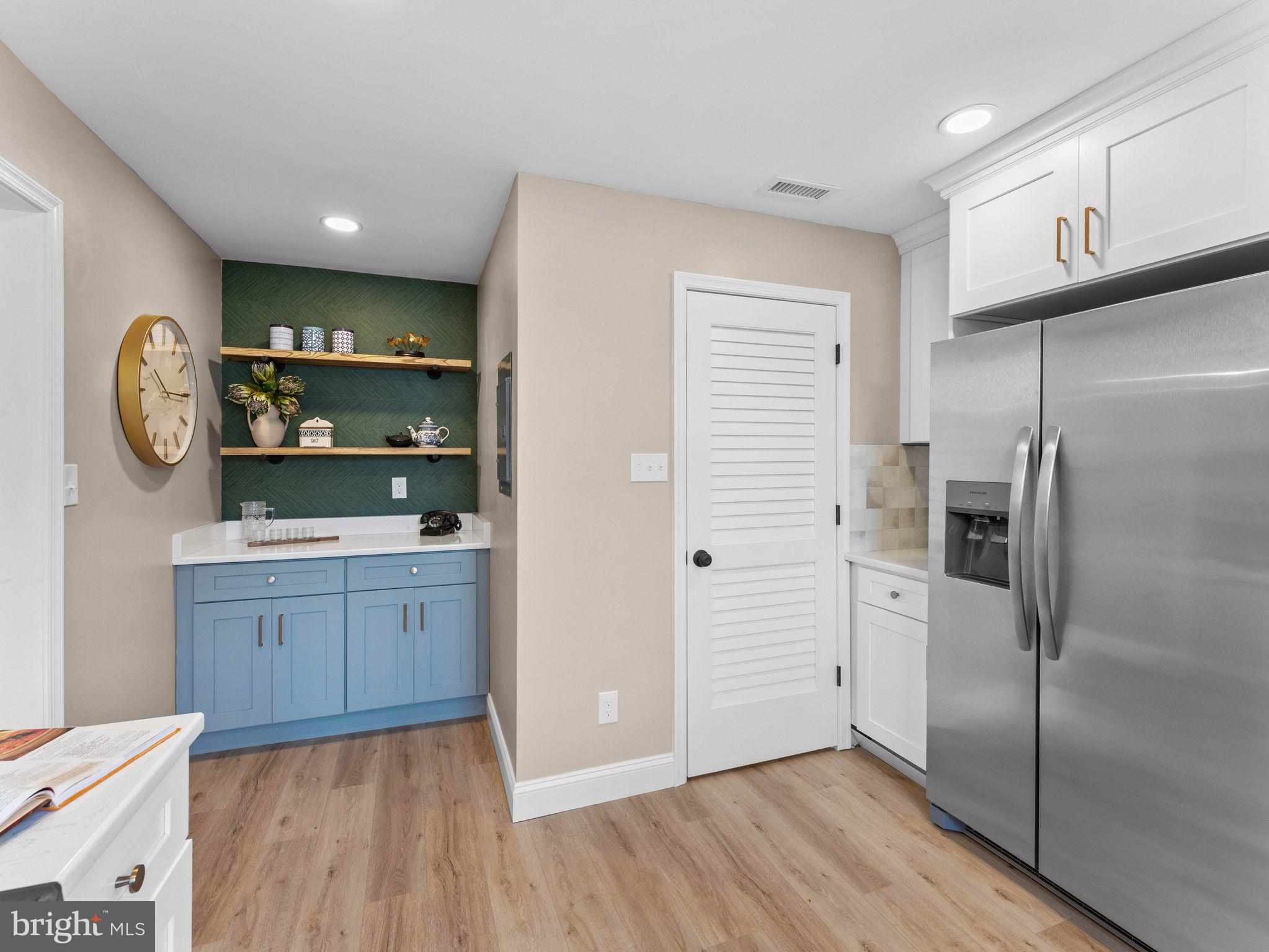 800 Bentley Road Lindenwold, NJ 08021 - Photo 9 of 32 a kitchen with granite countertop a refrigerator and a stove top oven