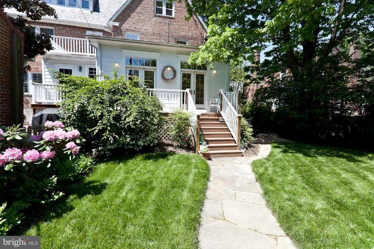 4229 Wickford Road Baltimore, MD 21210 - Photo 11 of 30 a view of a pathway with house on both side