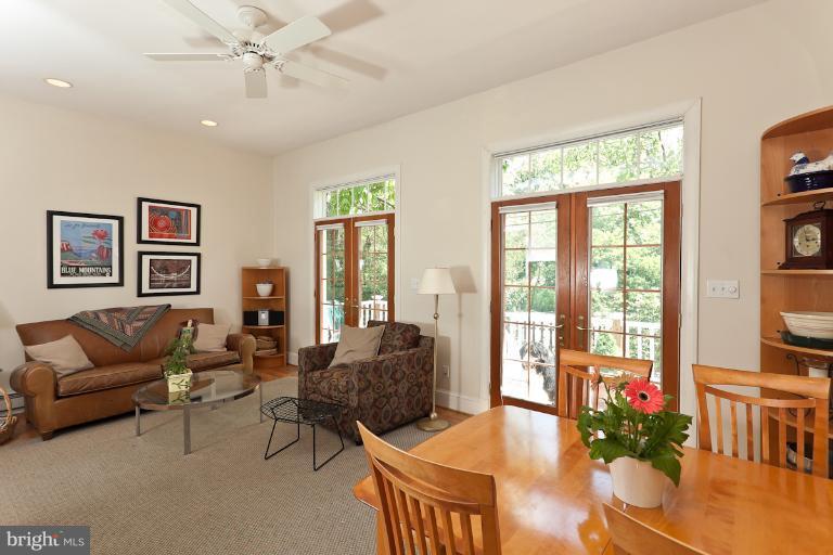 4229 Wickford Road Baltimore, MD 21210 - Photo 15 of 30 a living room with furniture and a large window