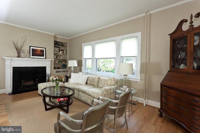 4229 Wickford Road Baltimore, MD 21210 - Photo 3 of 30 a living room with furniture and a fireplace