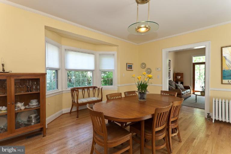 4229 Wickford Road Baltimore, MD 21210 - Photo 23 of 30 a view of a dining room with furniture window and wooden floor