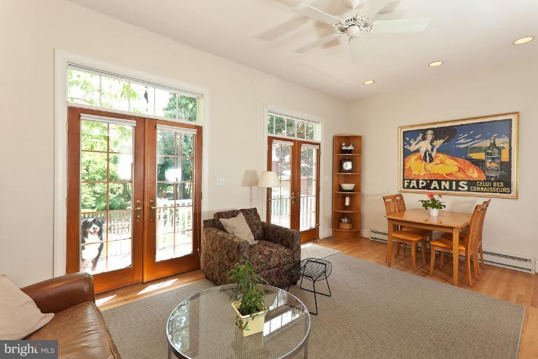 4229 Wickford Road Baltimore, MD 21210 - Photo 24 of 30 a living room with furniture and a large window