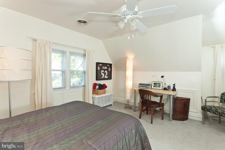4229 Wickford Road Baltimore, MD 21210 - Photo 10 of 30 a bedroom with a bed and a desk
