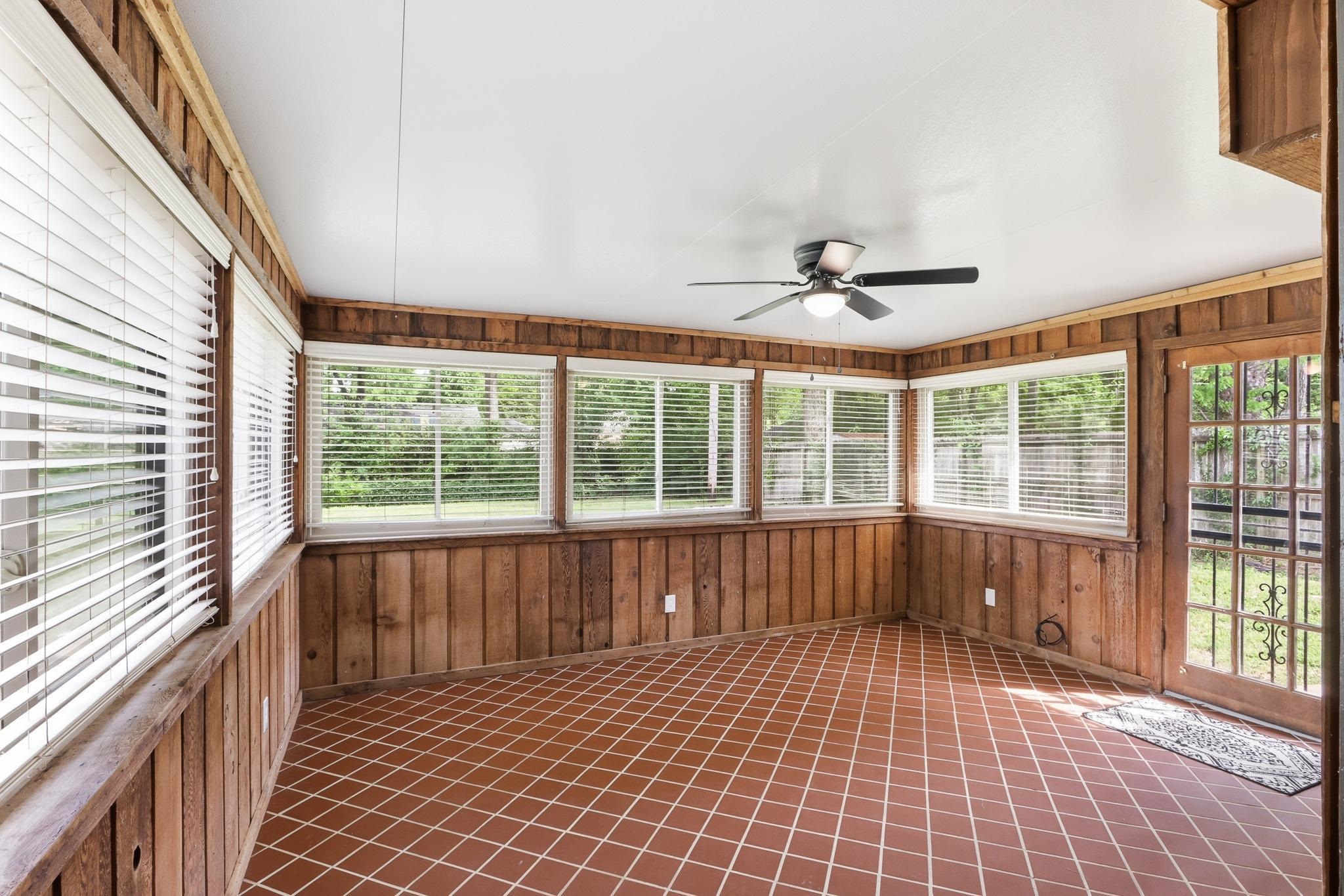 312 Fernway Road Memphis, TN 38117 - Photo 19 of 38 Unfurnished sunroom with wooden walls