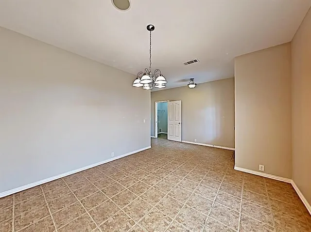 a view of a chandelier in a room