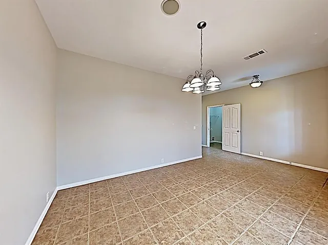 a view of a chandelier in a room