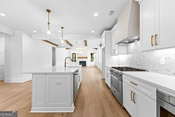 a bedroom with bed and a fireplace