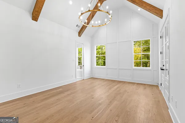 a bathroom with a bathtub and shower