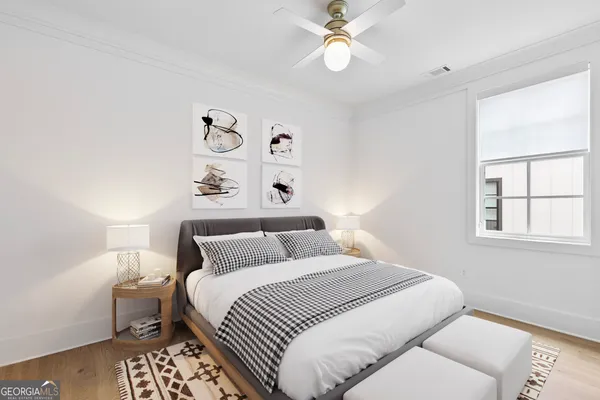 a view of a room with wooden floor and closet