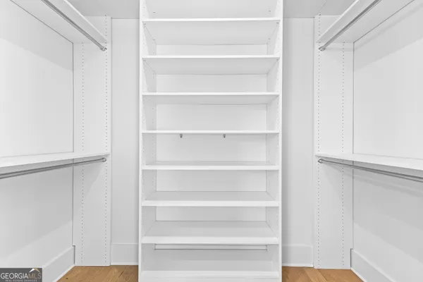 a view of empty room with windows