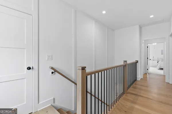a view of an empty room with a fireplace and a floor to ceiling window