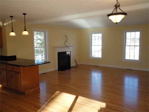 Lot 60 Hemlock West Roxbury, MA 02132 - Photo 9 of 9 a view of an empty room with wooden floor and a window