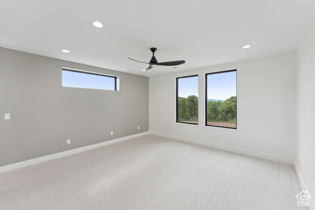 2280 East Outlaw Road, Unit 56 Kamas, UT 84036 - Photo 41 of 59 Spare room with light carpet, recessed lighting, and a ceiling fan