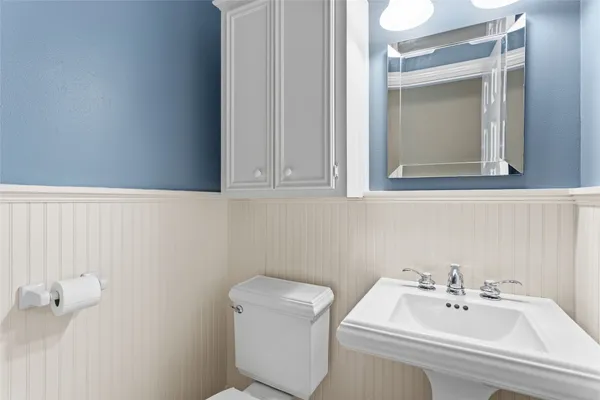 a bathroom with a sink and a toilet