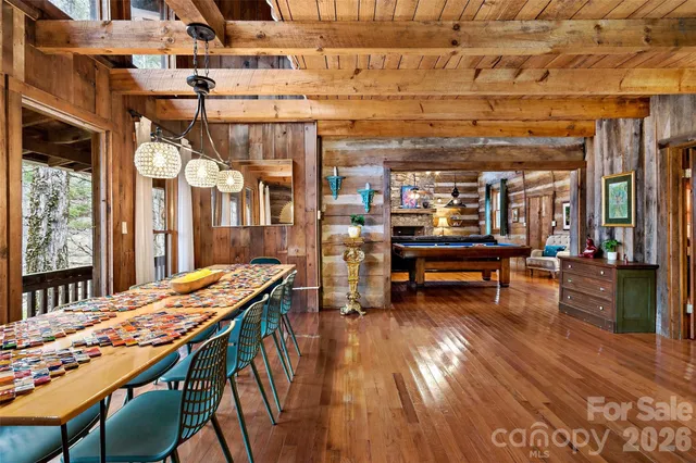 a living room with furniture and a clock