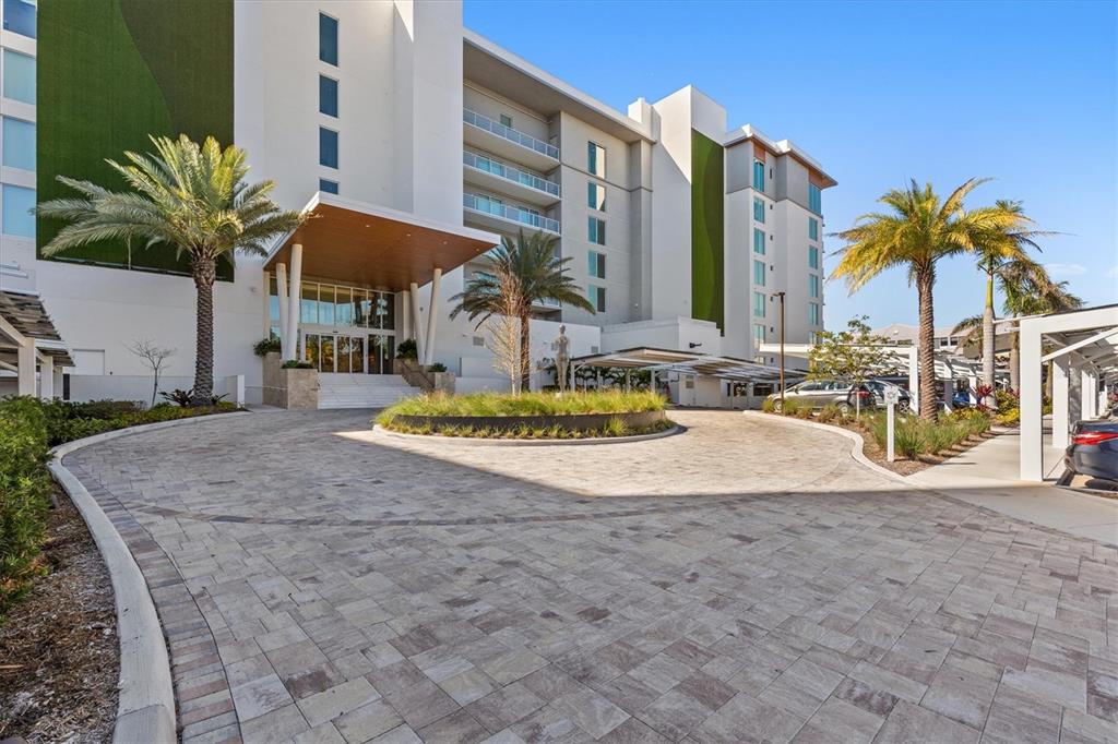 1020 Sunset Point Road, Unit 605 Clearwater, FL 33755 - Photo 18 of 35 a view of small pool and tall buildings