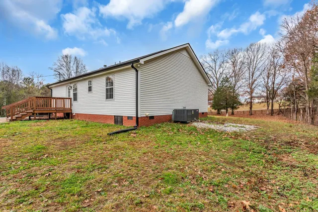 a view of a backyard with a garden