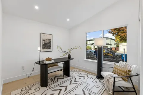 a view of a workspace with furniture