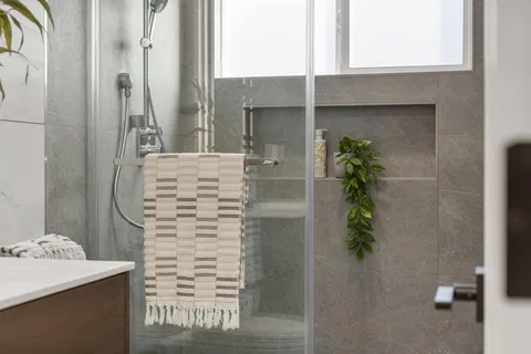 a bathroom with a sink and a shower