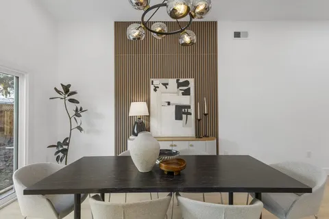 a view of a workspace with furniture