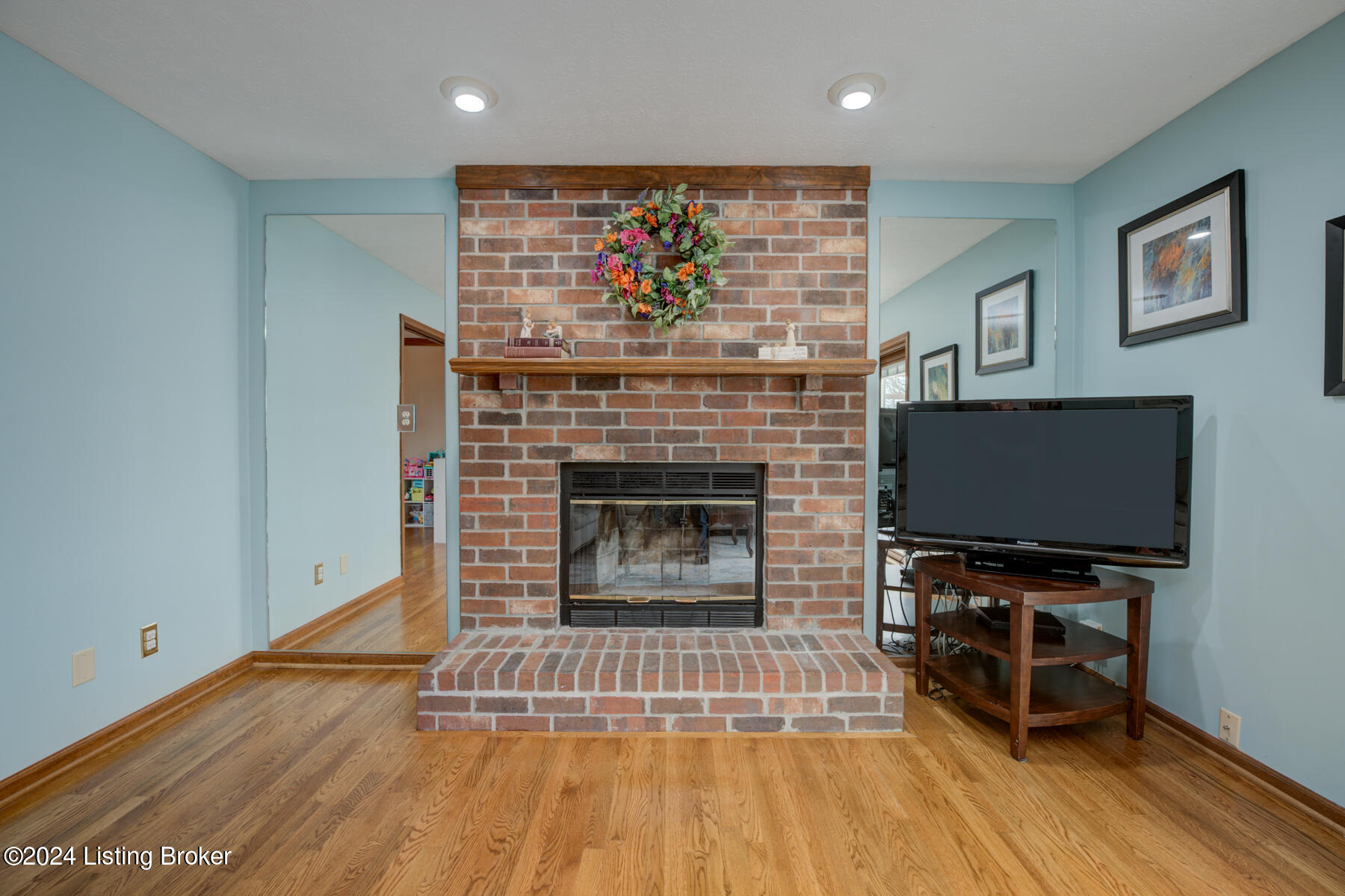 4208 Seagrape Road Louisville, KY 40299 - Photo 11 of 38 Family room with wood burning fireplace