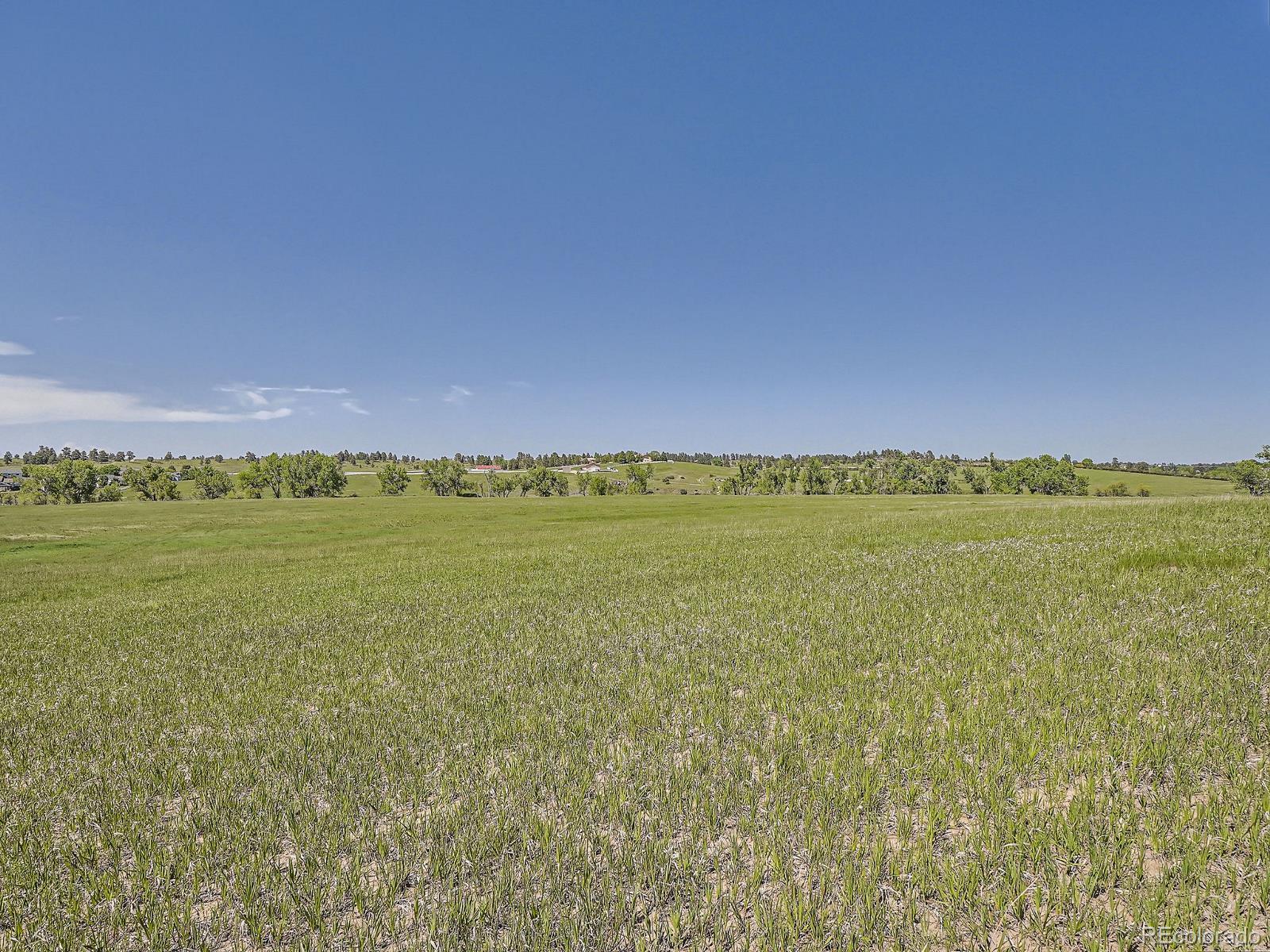 10443 Tomahawk Road Parker, CO 80138 - Photo 18 of 38 a view of an ocean and beach