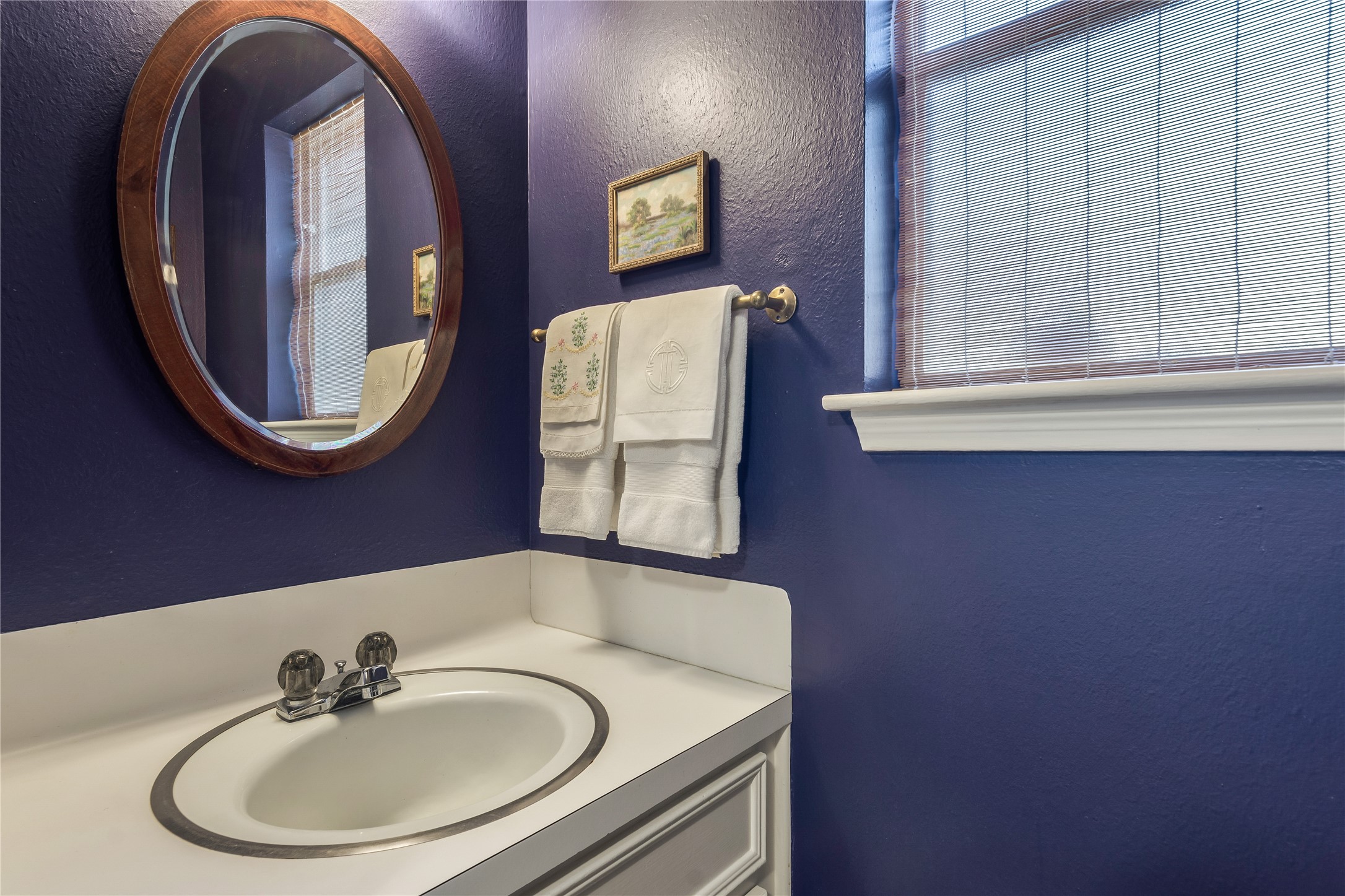 7622 Feliciana Lane Spring, TX 77379 - Photo 17 of 34 a bathroom with a sink and a mirror