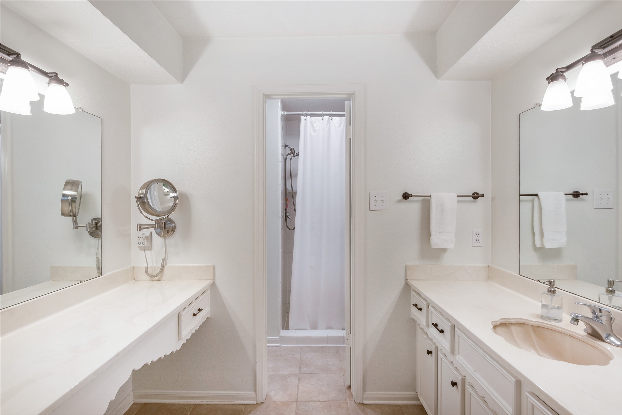 7622 Feliciana Lane Spring, TX 77379 - Photo 22 of 34 a bathroom with a tub sink and mirror
