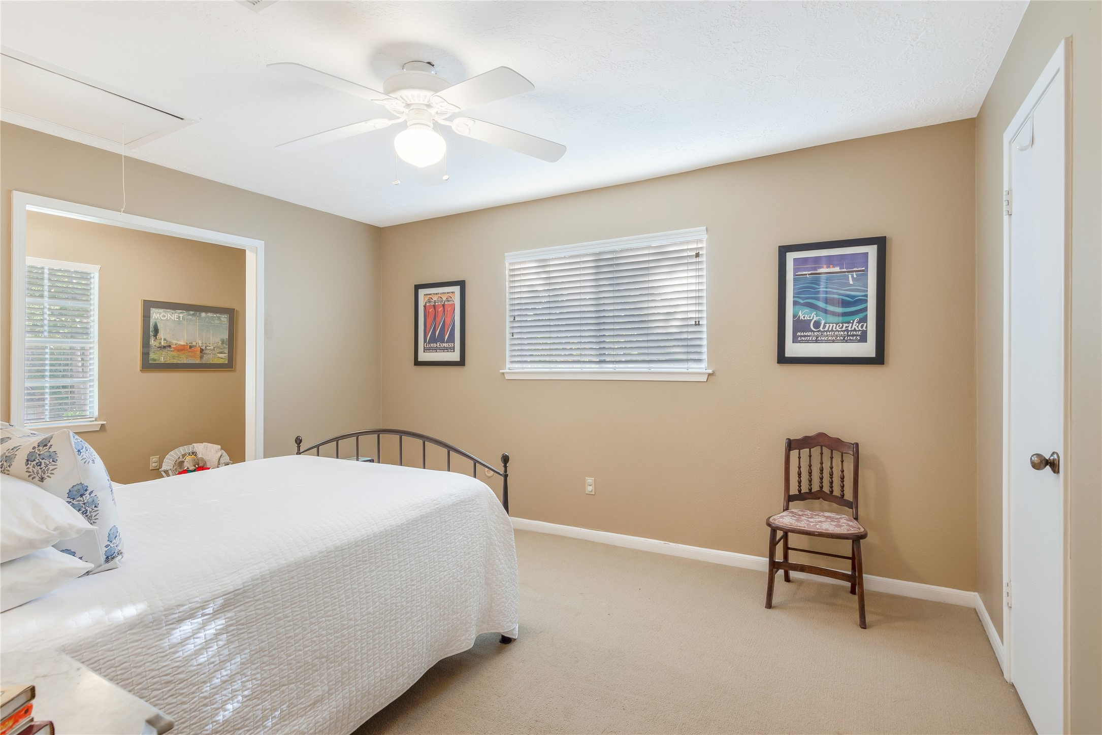 7622 Feliciana Lane Spring, TX 77379 - Photo 29 of 34 a bedroom with a bed and a chair