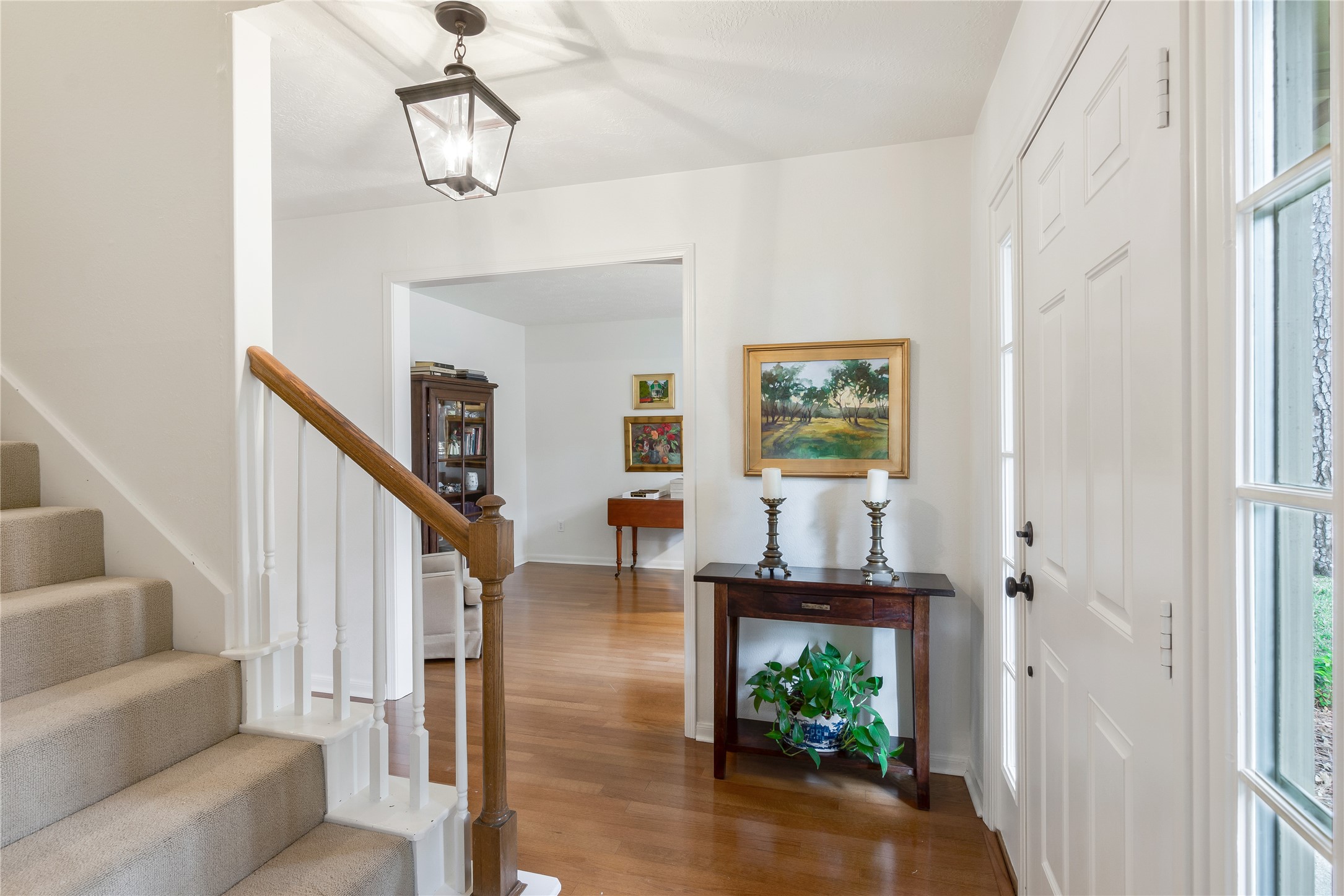 7622 Feliciana Lane Spring, TX 77379 - Photo 4 of 34 a living room with furniture and a chandelier