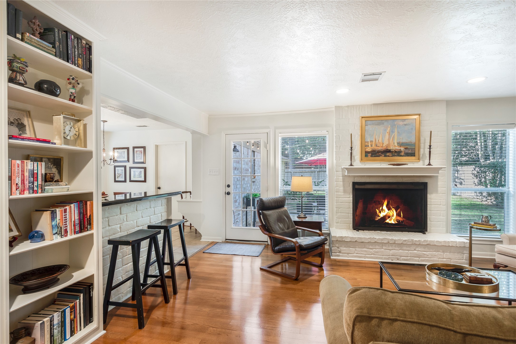7622 Feliciana Lane Spring, TX 77379 - Photo 10 of 34 a living room with furniture and a fireplace