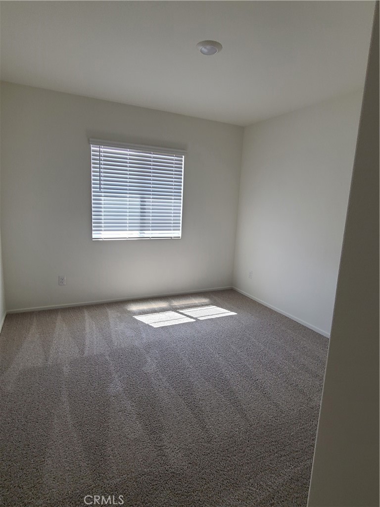 30540 Altima Court Winchester, CA 92596 - Photo 11 of 21 an empty room with a window