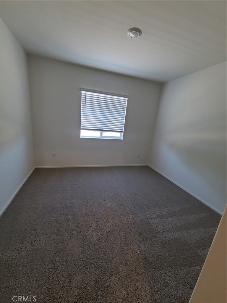 30540 Altima Court Winchester, CA 92596 - Photo 15 of 21 an empty room with a window