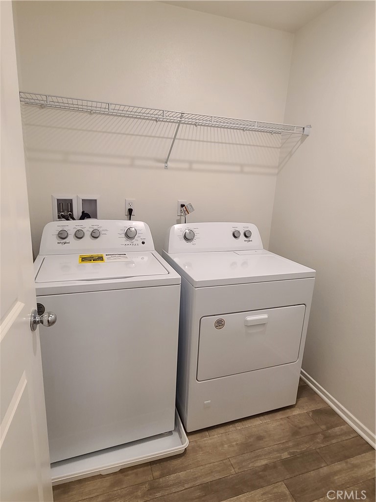 30540 Altima Court Winchester, CA 92596 - Photo 21 of 21 a utility room with dryer and washer