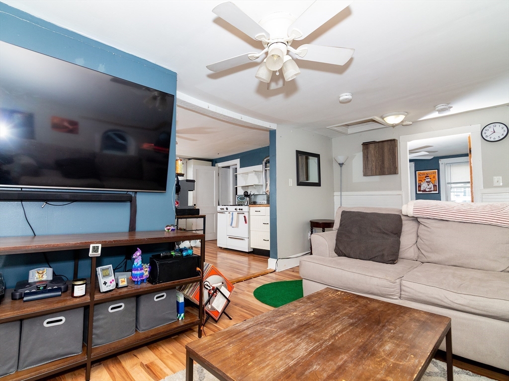 38 Depot Street Milford, MA 01757 - Photo 22 of 34 a living room with furniture and a flat screen tv